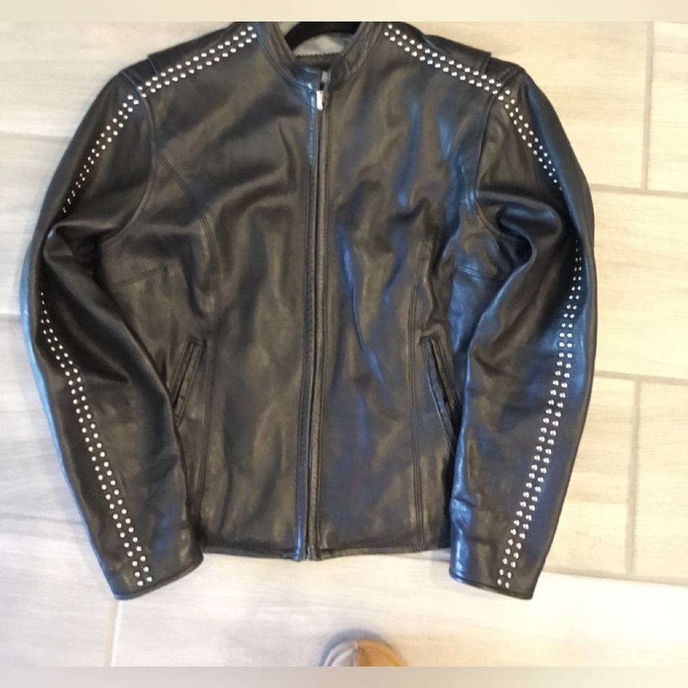 Mint condition Women Size Small studded Harley Davidson leather jacket.